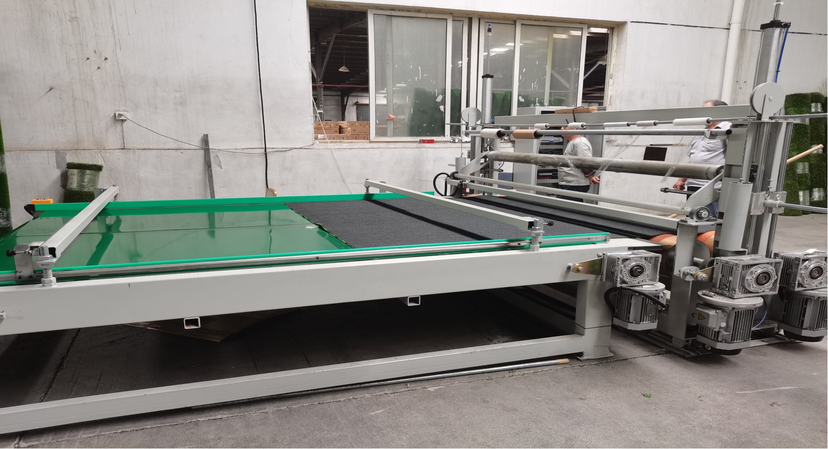 Victurf has introduced a fully automatic artificial turf roll-winding machine